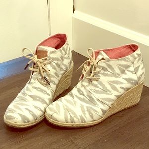 Grey and White TOMS platforms